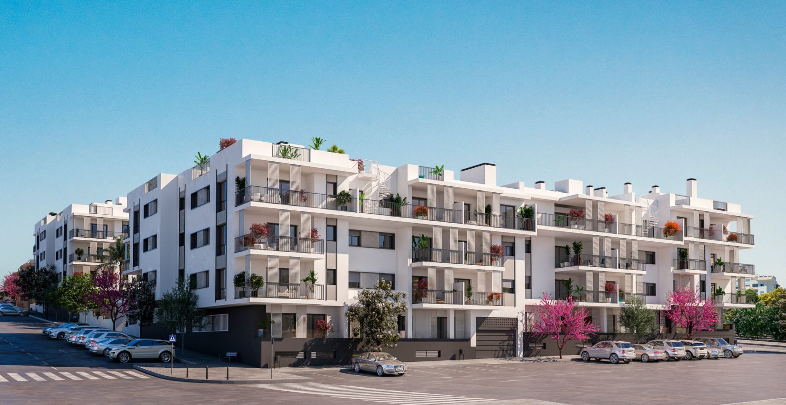 Modern apartment building with balconies, parking, and landscaped courtyard.